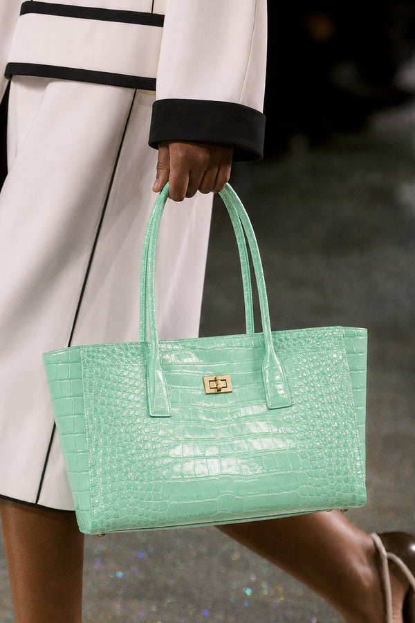 Structured glossy crocodile-embossed tote bag with gold-tone turn-lock closure and double top handles, detail view 9