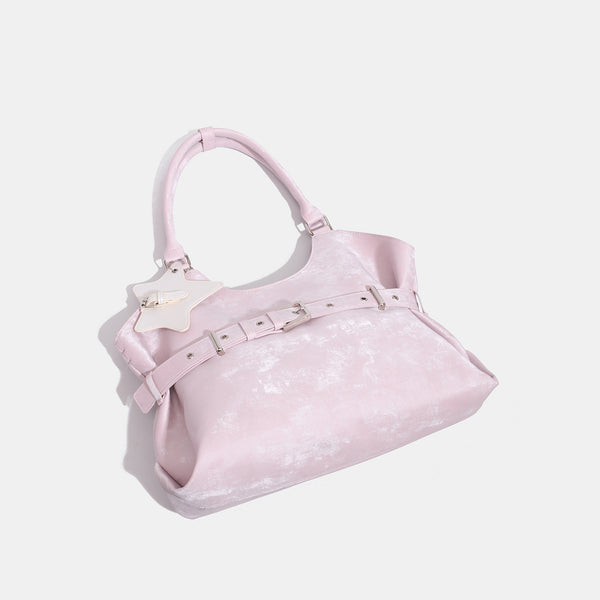 Large soft hobo shoulder bag with glossy textured finish, decorative belt buckle, star charm, and silver-tone hardware