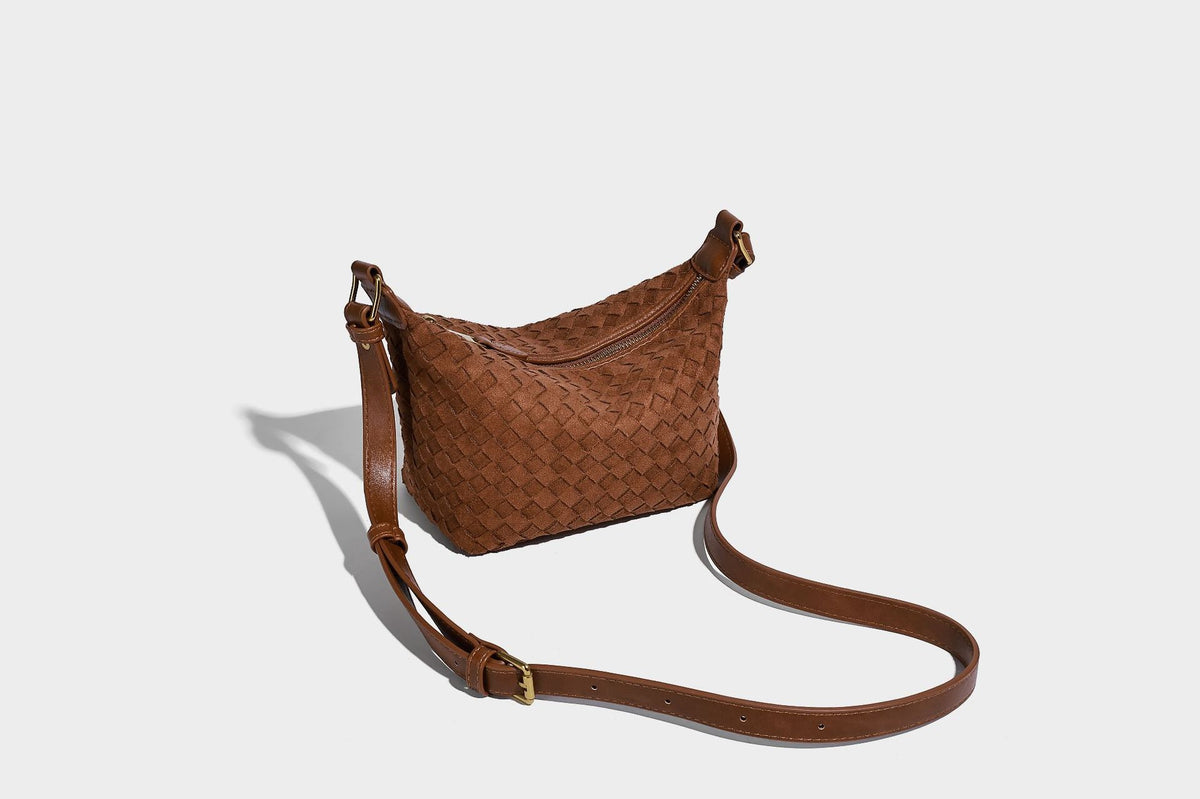 Small woven-texture crescent hobo bag in dark chocolate brown with top zip closure, gold-tone hardware, and adjustable