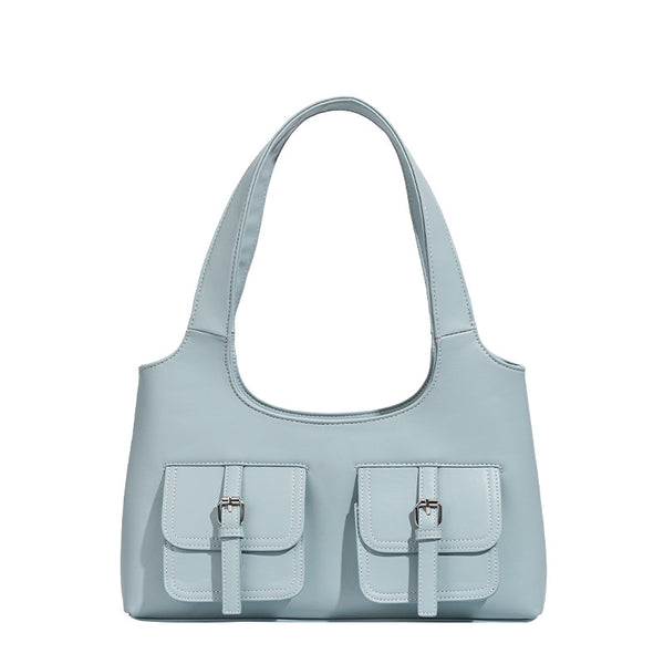 Powder blue structured tote bag with dual front flap buckle pockets and silver-tone hardware, detail view 5