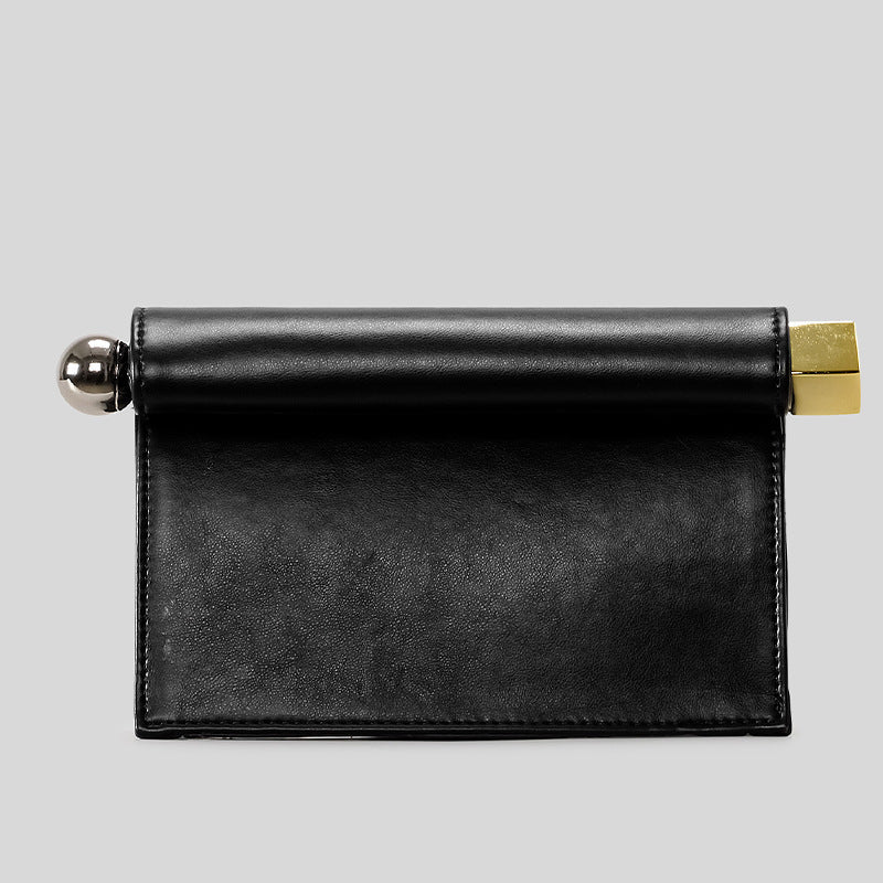 Structured rectangular clutch bag with rolled-top bar closure, gold-tone and silver-tone mixed metal hardware, detail view 7