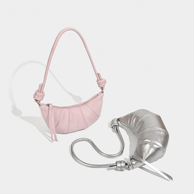 Pleated half-moon crossbody bag with knotted shoulder strap, detail view 2
