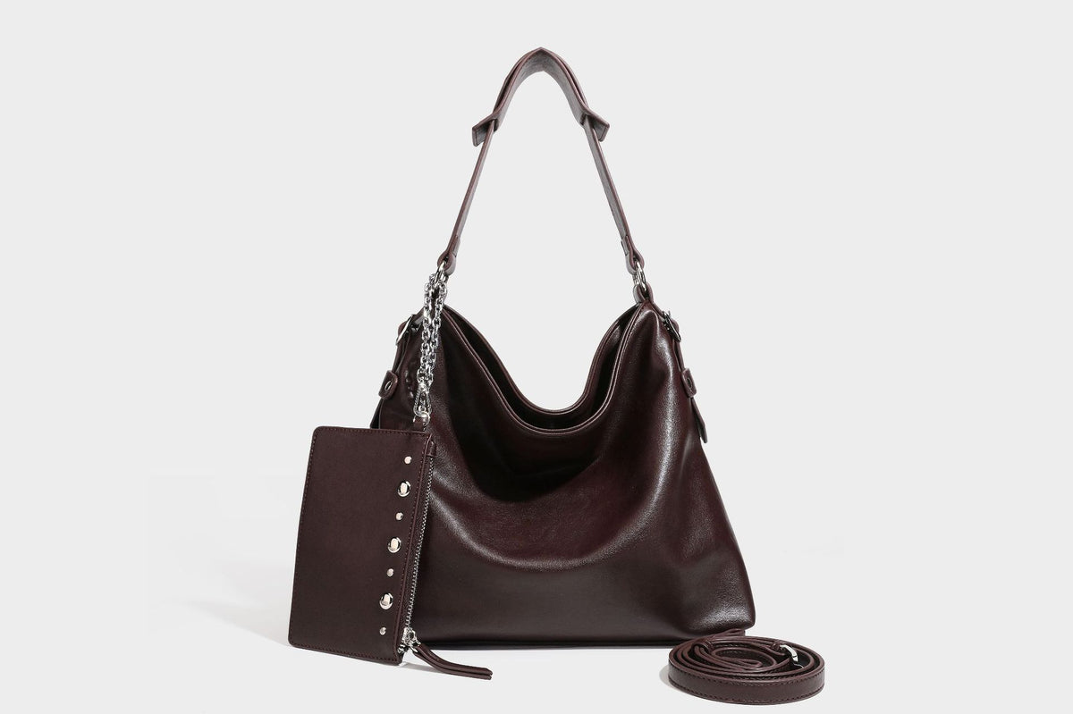Large slouchy hobo shoulder bag in dark brown with smooth leather-look finish, adjustable strap, and silver-tone hardware