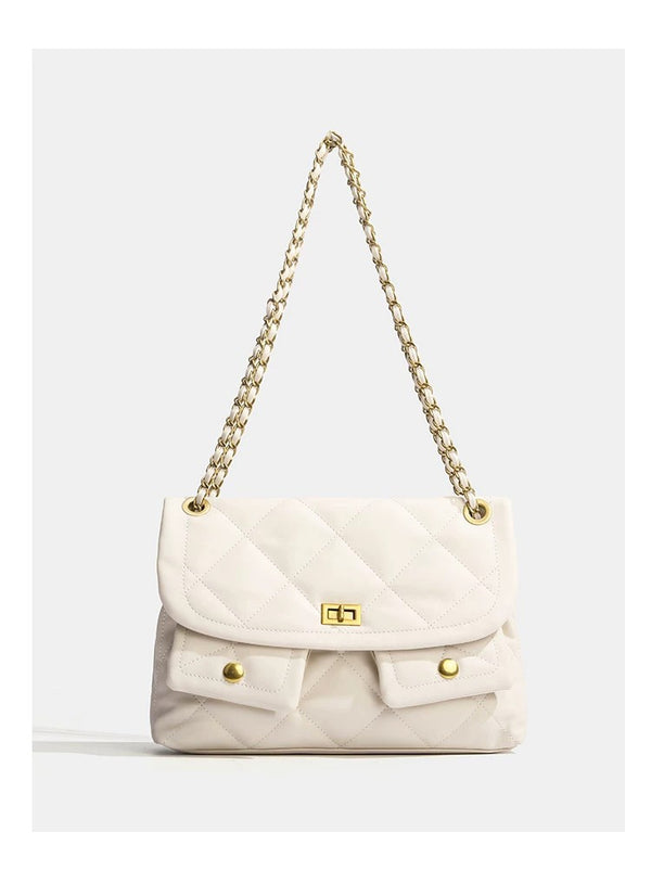 Quilted diamond flap shoulder bag with gold-tone chain strap and twist-lock closure, detail view 11