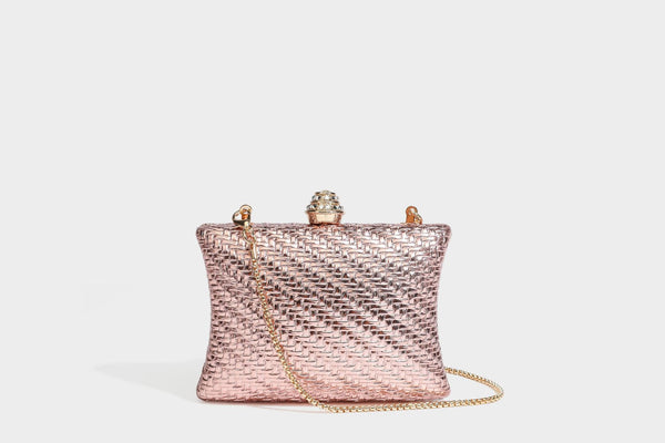 Small structured rectangular metallic woven-texture clutch bag with jeweled knob clasp and gold-tone chain strap, detail view
