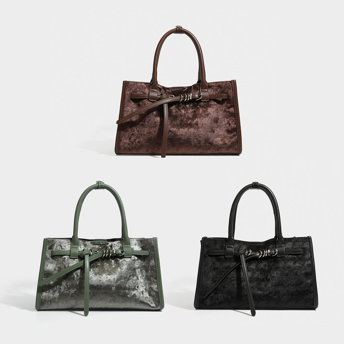 Structured rectangular tote bag with mottled velvet-like textured panels, smooth contrast trim, twin rounded top handles