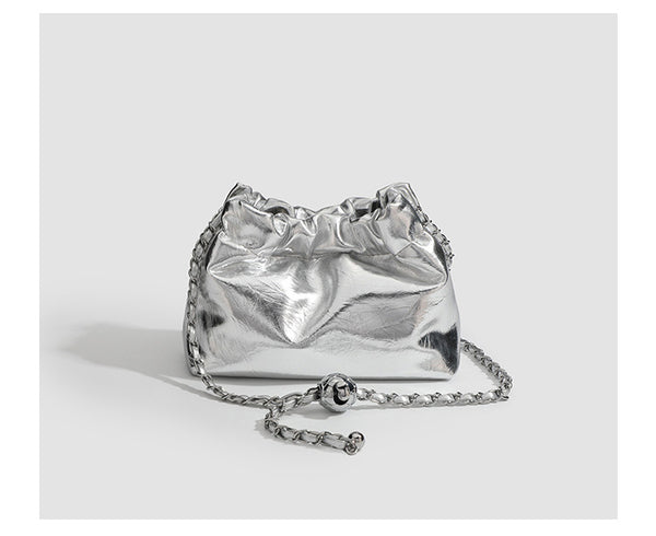 Small ruched drawstring bucket bag with twisted-link chain strap and pearl charm pull, detail view 10