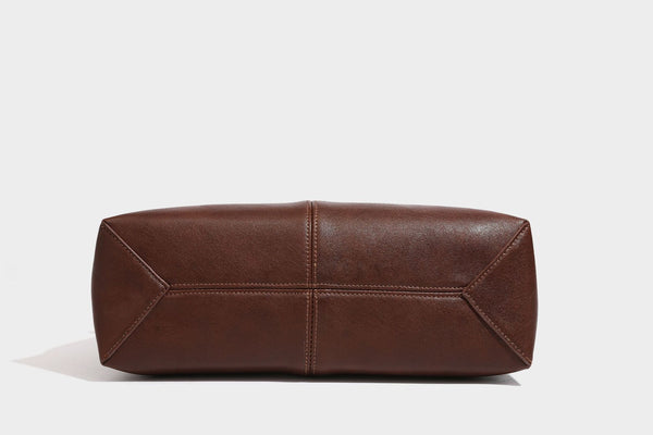 Structured rectangular satchel bag with dual rounded top handles and central metal turn-lock flap closure, detail view 20