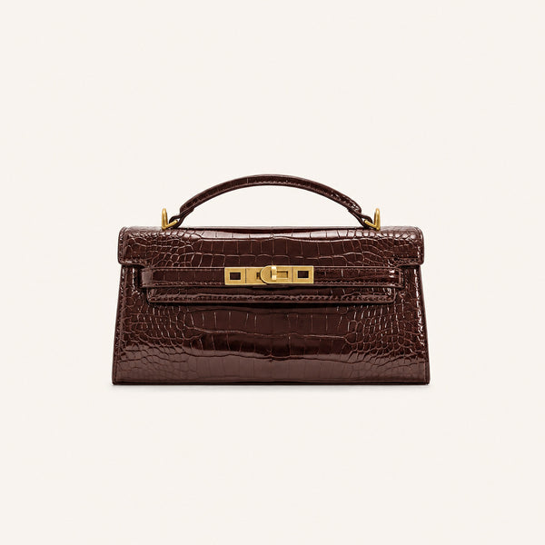 Strukturierte rechteckige Satchel-Tasche mit Krokodilprägung, goldfarbenem Drehverschluss und kurzem Henkel, Detailansicht 12