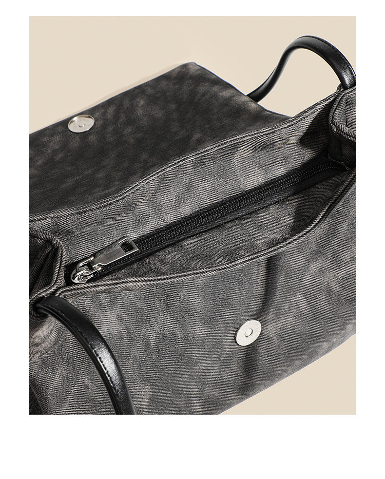 Washed leather-look shoulder tote bag with silver butterfly emblem and buckle hardware, detail view 15