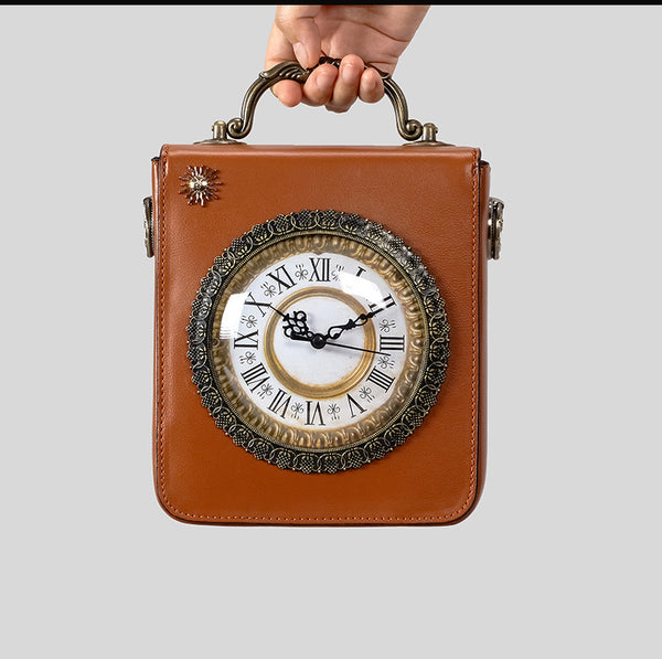 Small structured rectangular crossbody bag with ornate antique-style clock face and brass hardware in, detail view 10