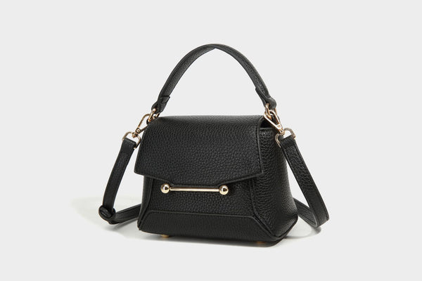 Small structured pebbled flap mini satchel with gold-tone bar hardware, short top handle, and detachable crossbody strap