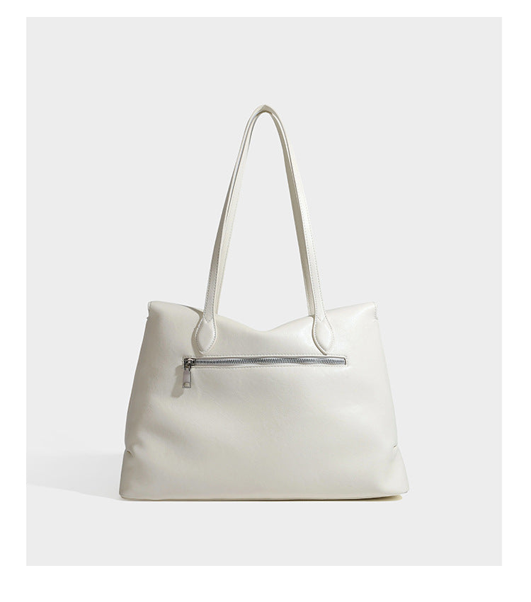 Large leather-look tote shoulder bag with slim double straps and silver-tone turn-lock closure, detail view 16