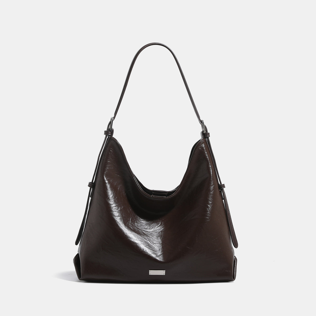 Slouchy hobo shoulder bag with glossy wrinkled leather-look finish, adjustable strap, and snap closure, detail view 8