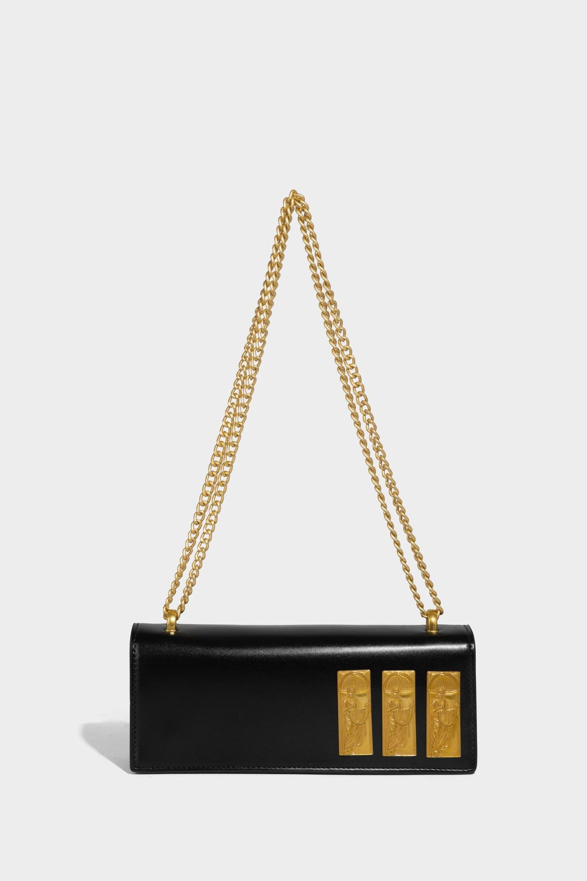 Structured rectangular crossbody bag with glossy finish, three vertical gold-tone embossed plaques, and gold chain strap
