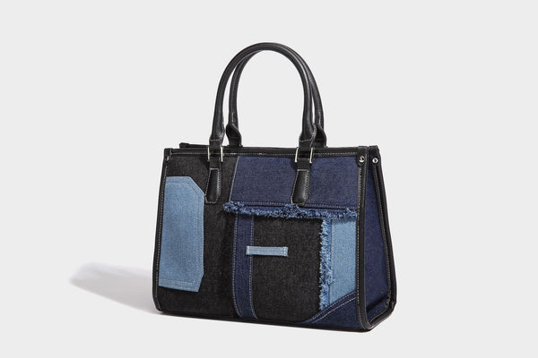 Structured patchwork denim tote bag with frayed panel seams, dual top handles, and silver-tone hardware, detail view 25