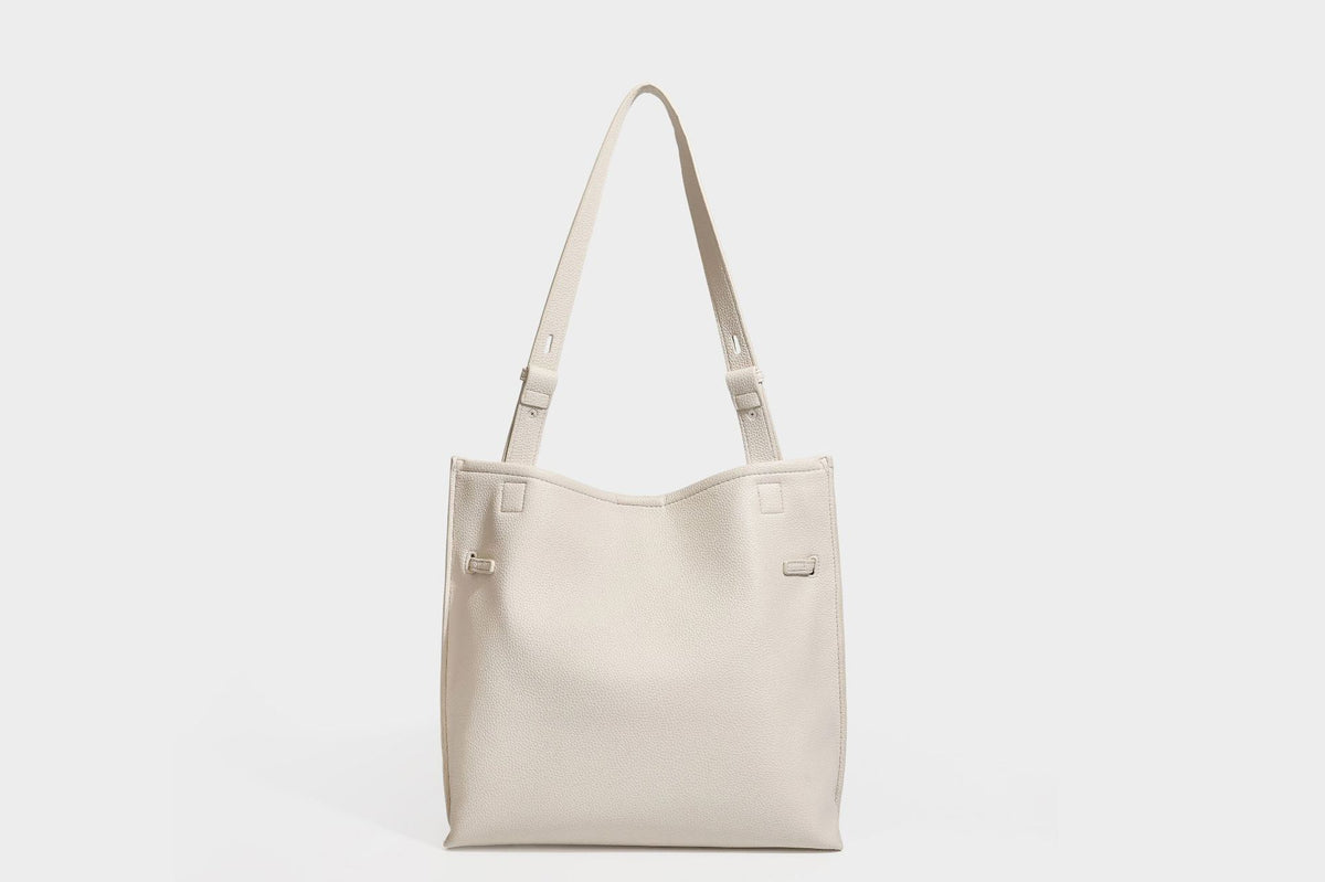Pebbled leather-look tote bag with front toggle hardware and long shoulder strap, detail view 38