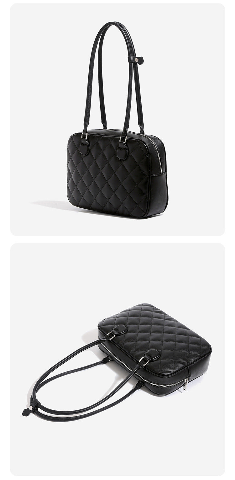 Structured diamond-quilted bowling shoulder bag with silver-tone hardware and top zip closure, detail view 14