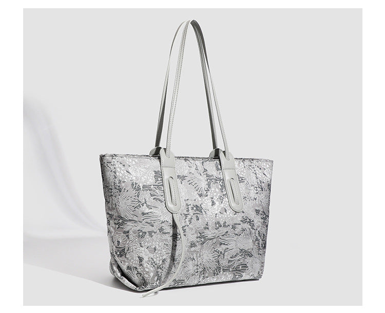 Large structured floral jacquard tote bag with long leather-look shoulder strap, detail view 13
