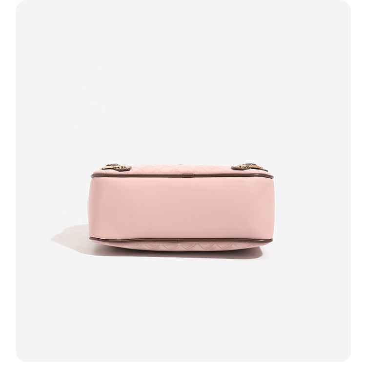 Small structured blush pink quilted diamond Boston barrel bag with brown leather-look trim, double top handles, heart accent