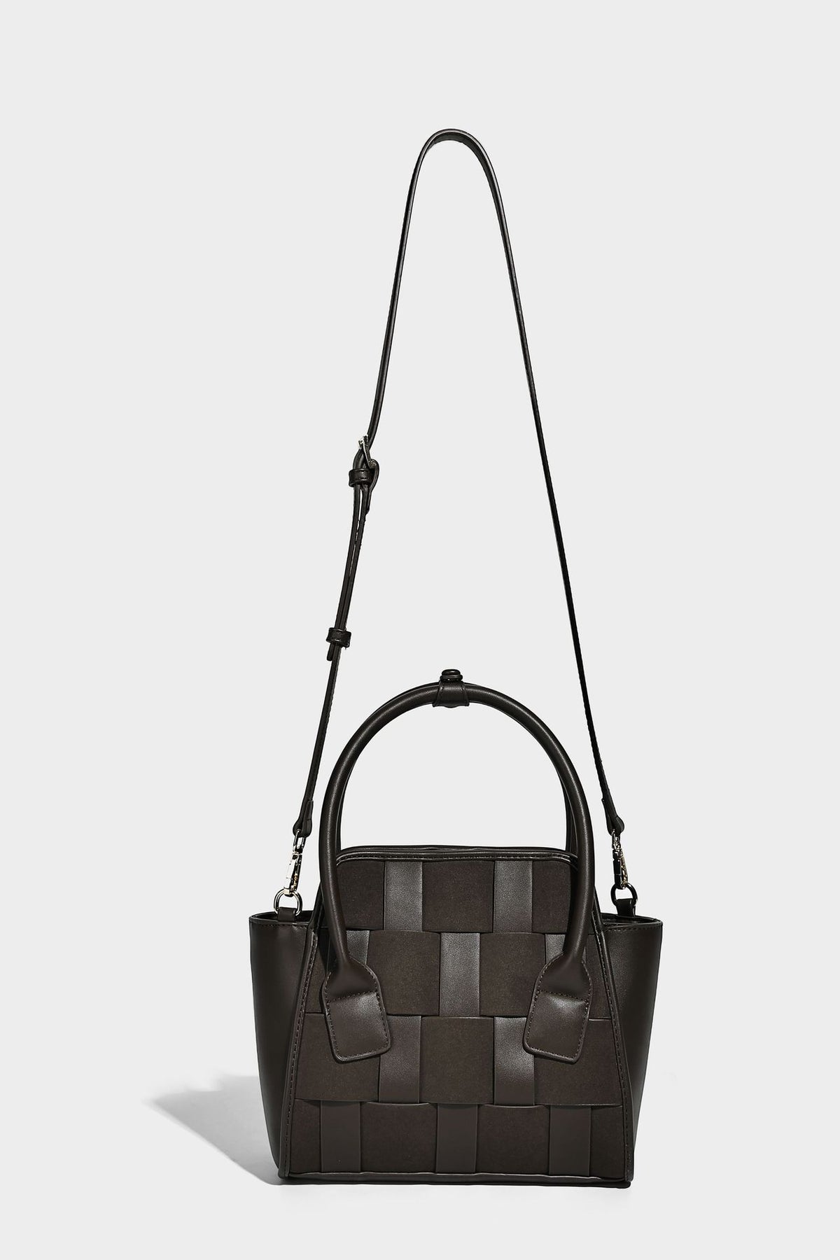 Small structured woven-panel mini tote bag with double top handles and detachable crossbody strap in matte leather-look