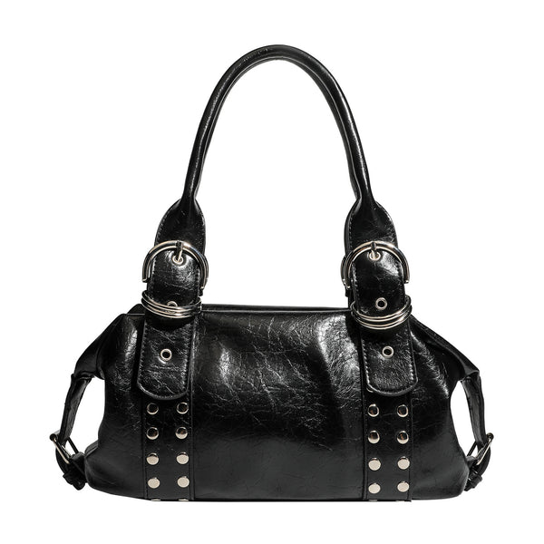 Compact black glossy leather-look satchel bag with silver-tone rivets, buckle hardware, and dual padded top handles, detail