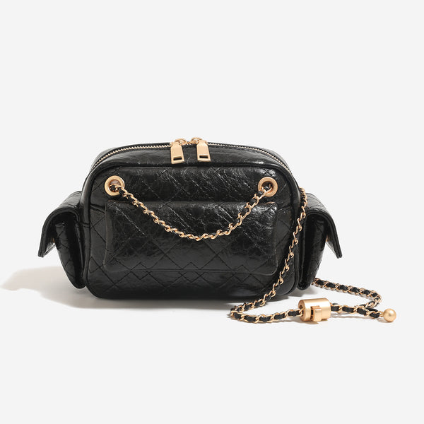Compact quilted leather-look crossbody bag with gold-tone chain strap and double zip closure, detail view 8