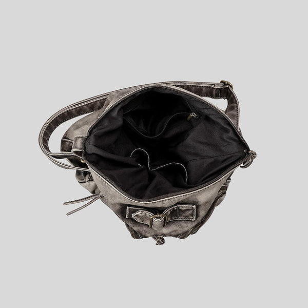 Distressed gunmetal gray hobo shoulder bag with multiple front zip pockets and adjustable crossbody strap, detail view 4