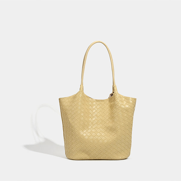 Large woven-texture open-top tote bag with single shoulder strap in butter yellow, front view