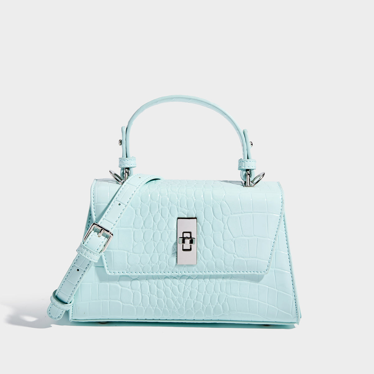 Small structured crocodile-embossed glossy top-handle satchel bag with silver-tone turn-lock clasp and detachable shoulder