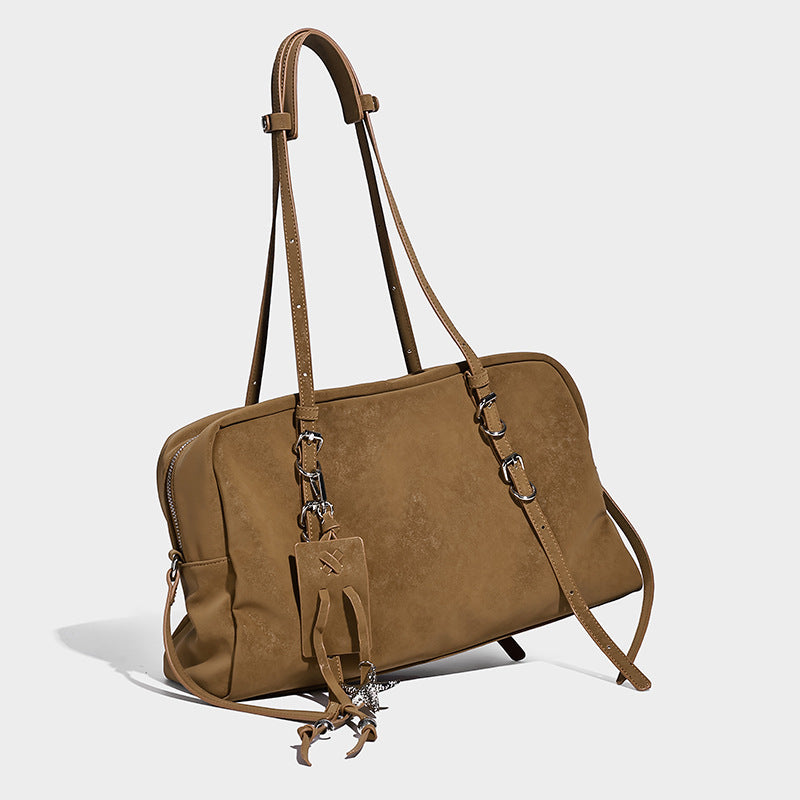 Structured rectangular matte suede-like shoulder bag with silver-tone hardware, zip closure, double top handles, and, detail