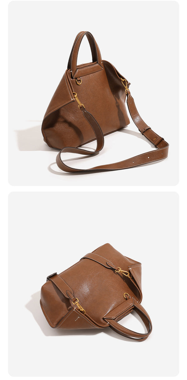Structured cognac brown leather-look tote bag with fold-ear side panels, top handles, gold-tone hardware, and detachable