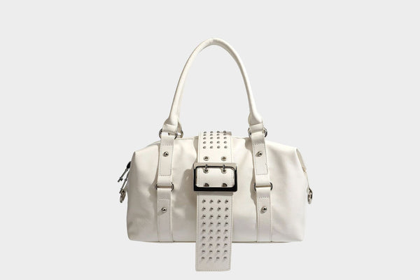 Glossy crinkled barrel handbag with silver stud buckle strap and detachable shoulder strap, detail view 23