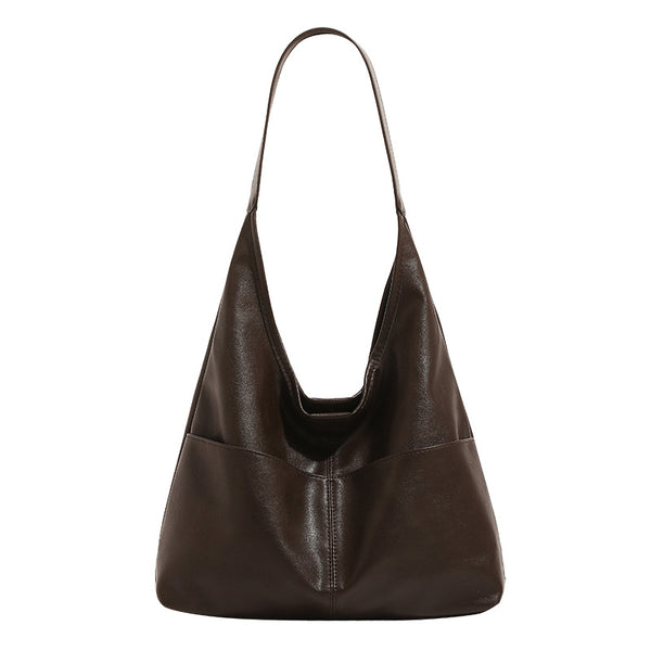 Oversized slouchy hobo tote bag in dark brown smooth matte leather-look finish with long flat shoulder strap and panelled