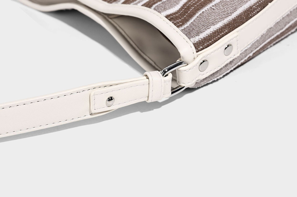 Large striped canvas hobo shoulder bag with cream trim and silver-tone hardware, detail view 19