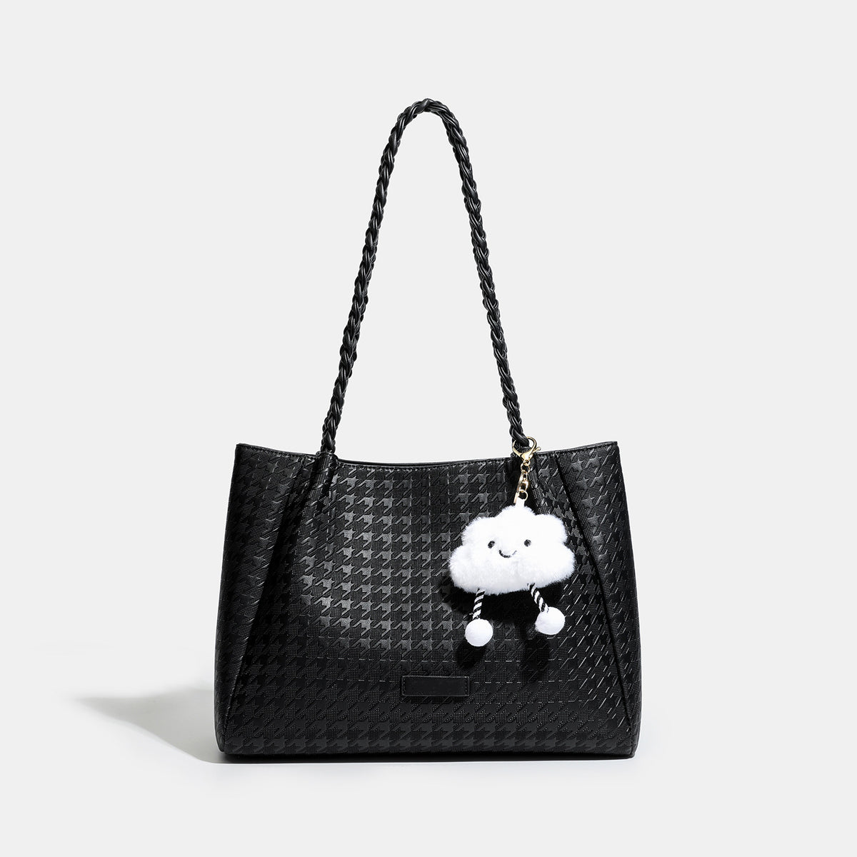 Structured geometric-embossed tote bag with braided shoulder straps and gold-tone hardware in ivory, detail view 6