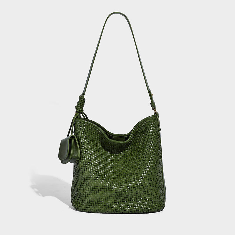 Woven leather-look bucket bag with basket-weave texture, attached mini pouch, and adjustable shoulder strap, detail view 9