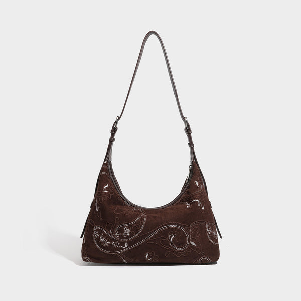 Deep chocolate suede-look hobo shoulder bag with tonal paisley floral embroidery, smooth dark leather-look trim, top zip