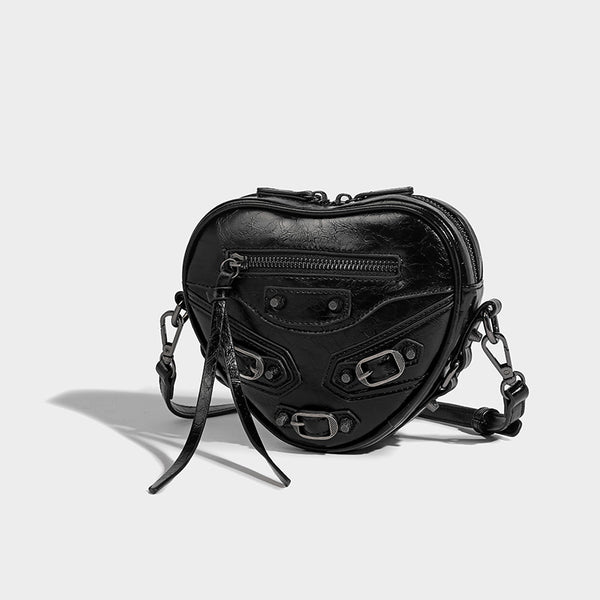 Mini heart-shaped crossbody bag with glossy crinkled finish and moto buckle hardware, detail view 19