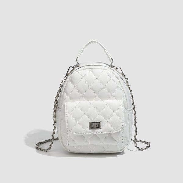 Quilted leather-look backpack purse with chain strap and turn-lock front pocket, detail view 11