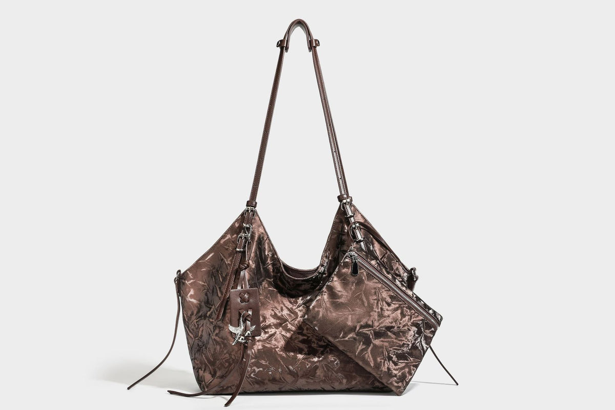 Slouchy crinkle-finish shoulder tote bag with silver hardware and attached zip pouch, detail view 24