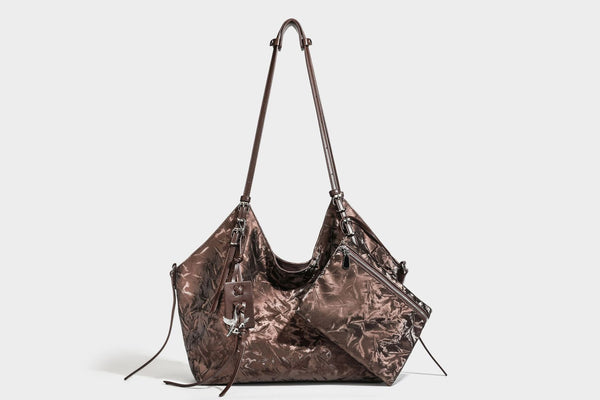 Slouchy crinkle-finish shoulder tote bag with silver hardware and attached zip pouch, detail view 24