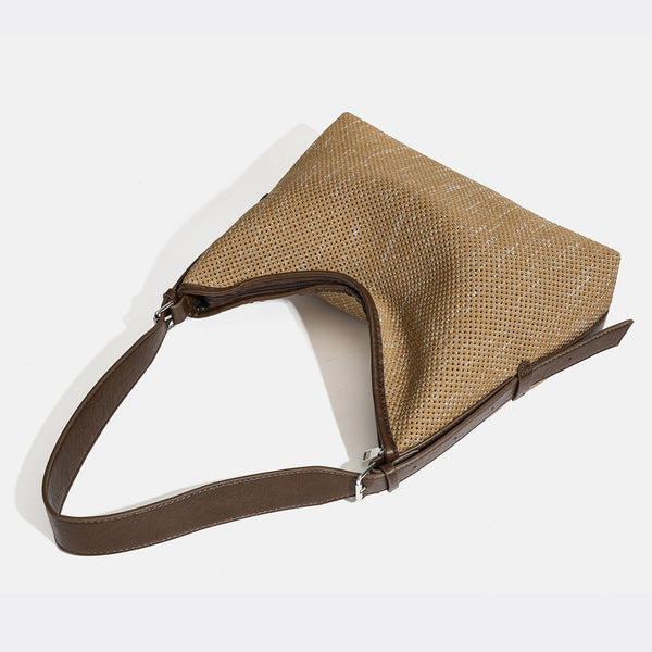 Large slouchy woven shoulder bag with dark brown leather-look trim and adjustable strap, detail view 3