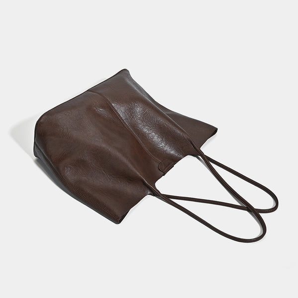 Large open-top leather-look tote bag with single shoulder strap and crinkle texture, detail view 4