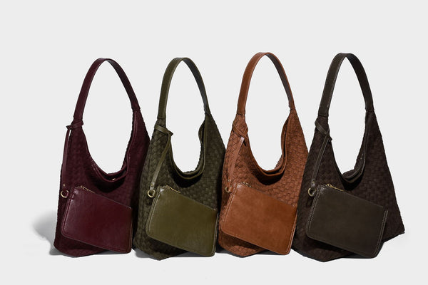 Large slouchy woven hobo tote bag with curved shoulder strap and triangular silhouette, detail view 32