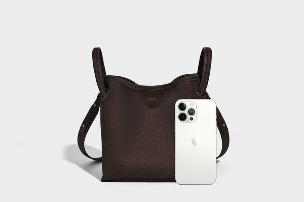 Small structured matte pebbled tote bag with twin top handles and removable zip pouch, detail view 14