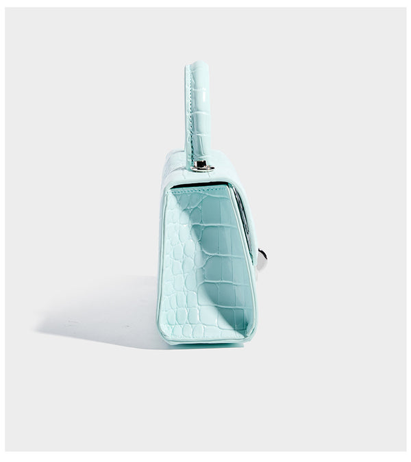 Mini croc-embossed glossy structured handbag with silver-tone turn-lock clasp and short top handle, detail view 12