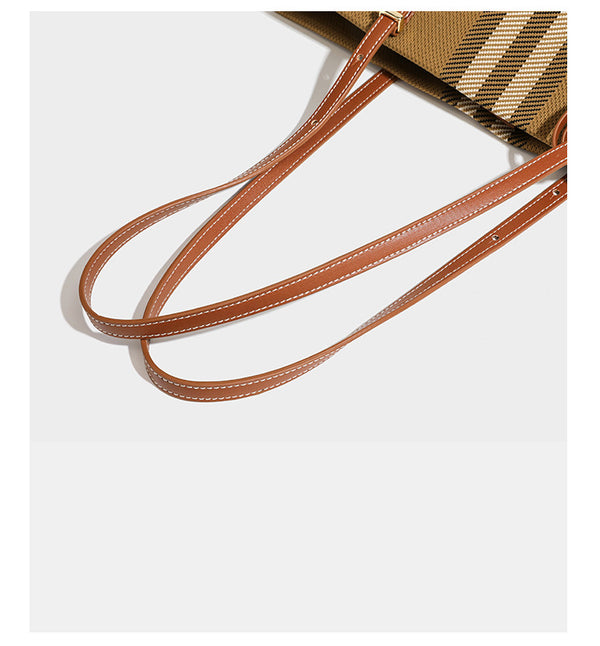 Large structured plaid check tote bag with smooth tan leather-look shoulder straps, attached front zip pouch, and gold-tone