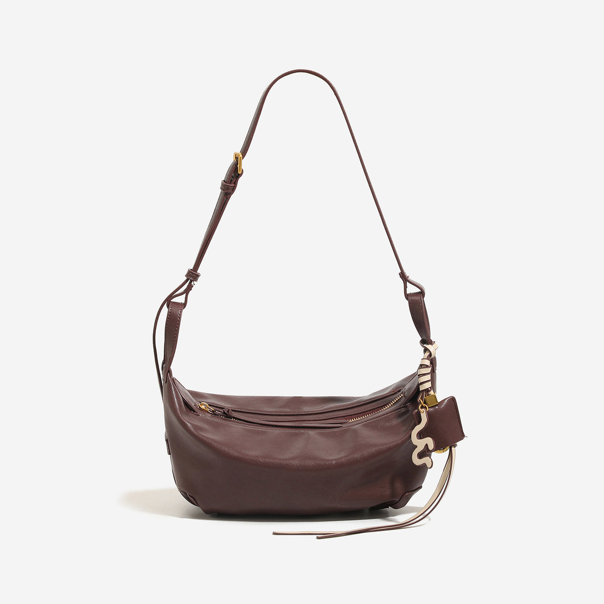 Weich fallende, halbmondförmige Hobo-Schultertasche mit glatter Lederoptik, Reißverschluss oben und goldfarbenen Beschlägen, Detailansicht