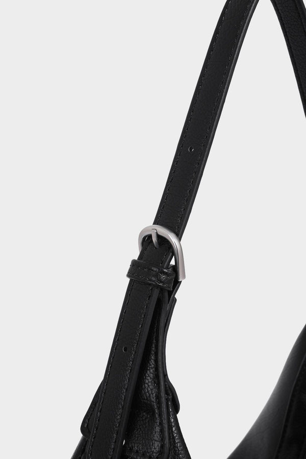 Crescent half-moon shoulder bag in pebbled leather-look finish with adjustable strap and silver-tone hardware, detail view 23